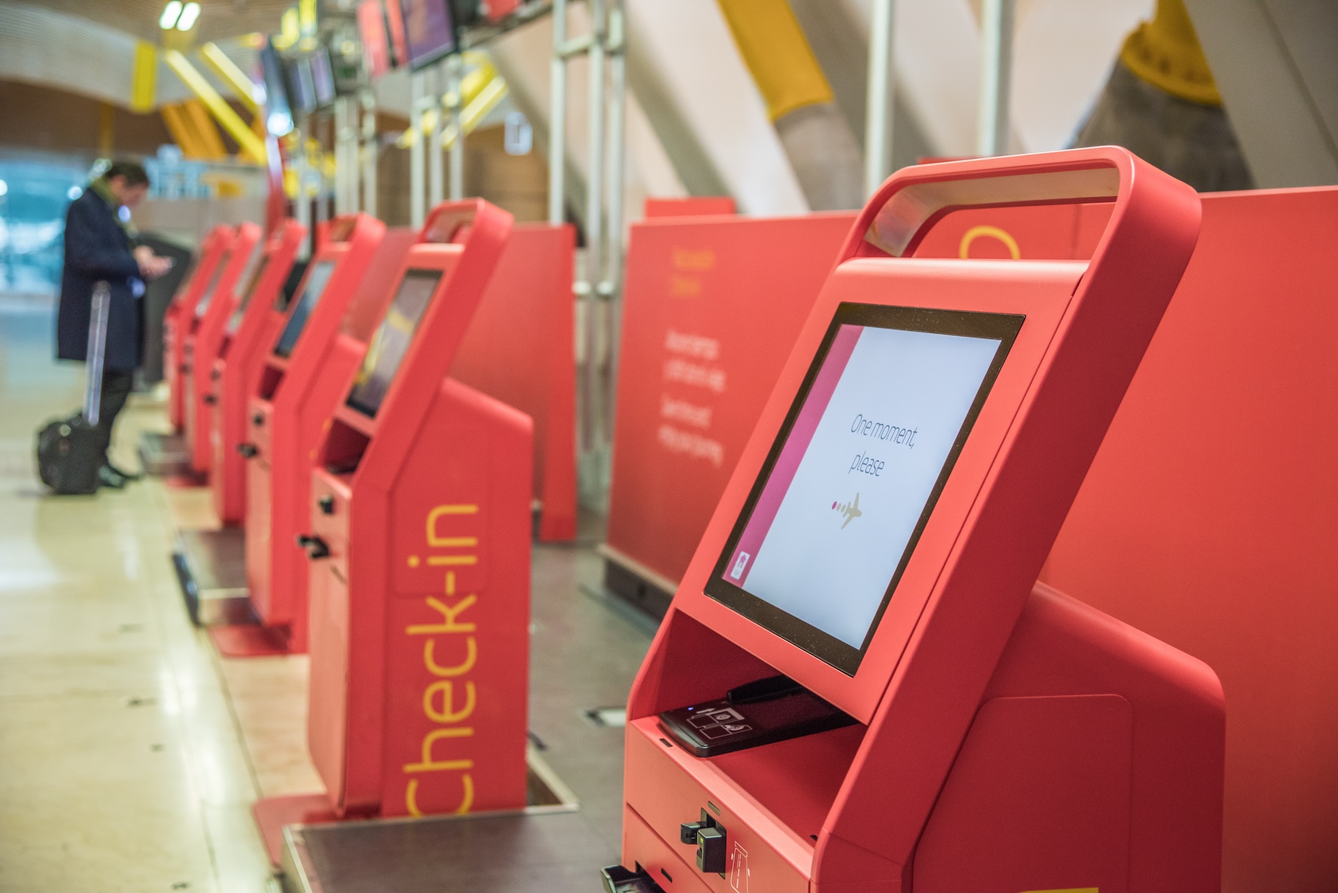 red self machines check-in service at the airport kiosk